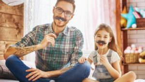 Picture of dad and daughter with mustaches for Movember